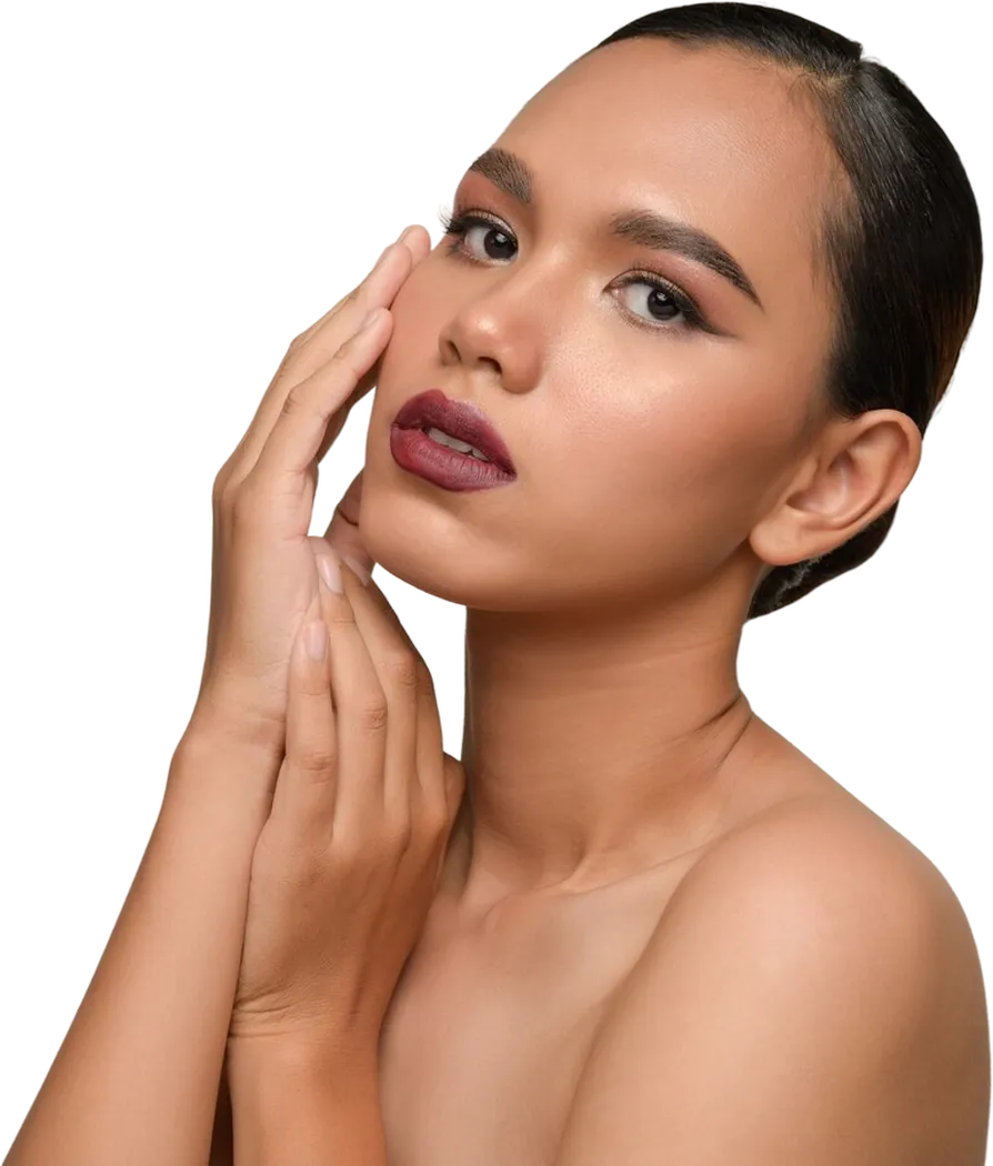 Woman touching her cheek, showing smooth skin