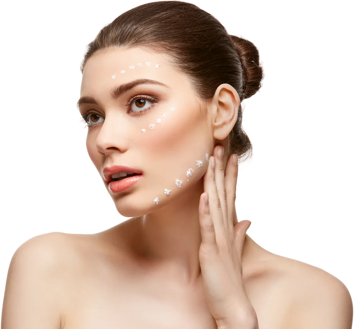 Woman with treatment marks along her cheek and jaw