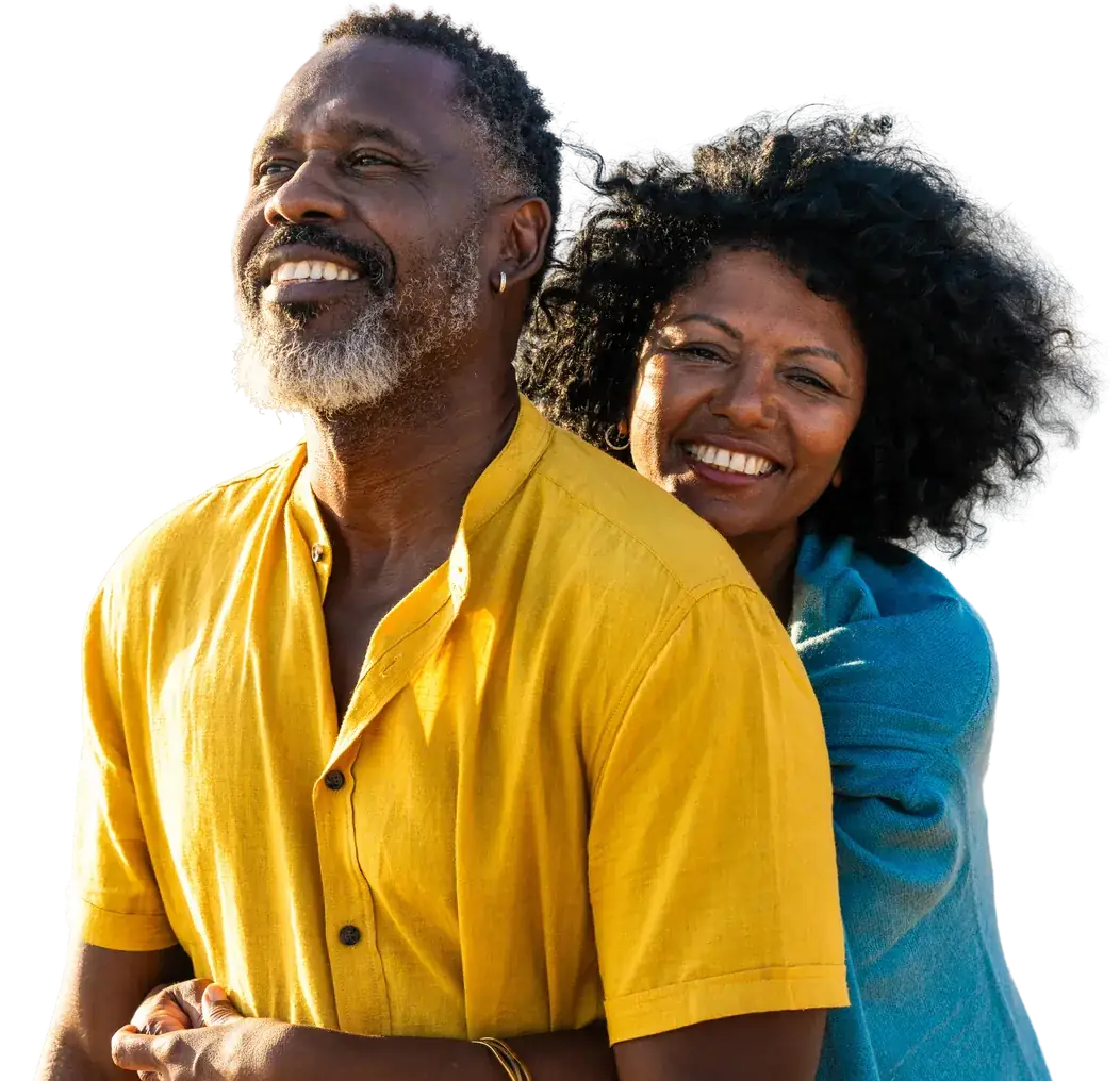 Smiling couple embracing outdoors