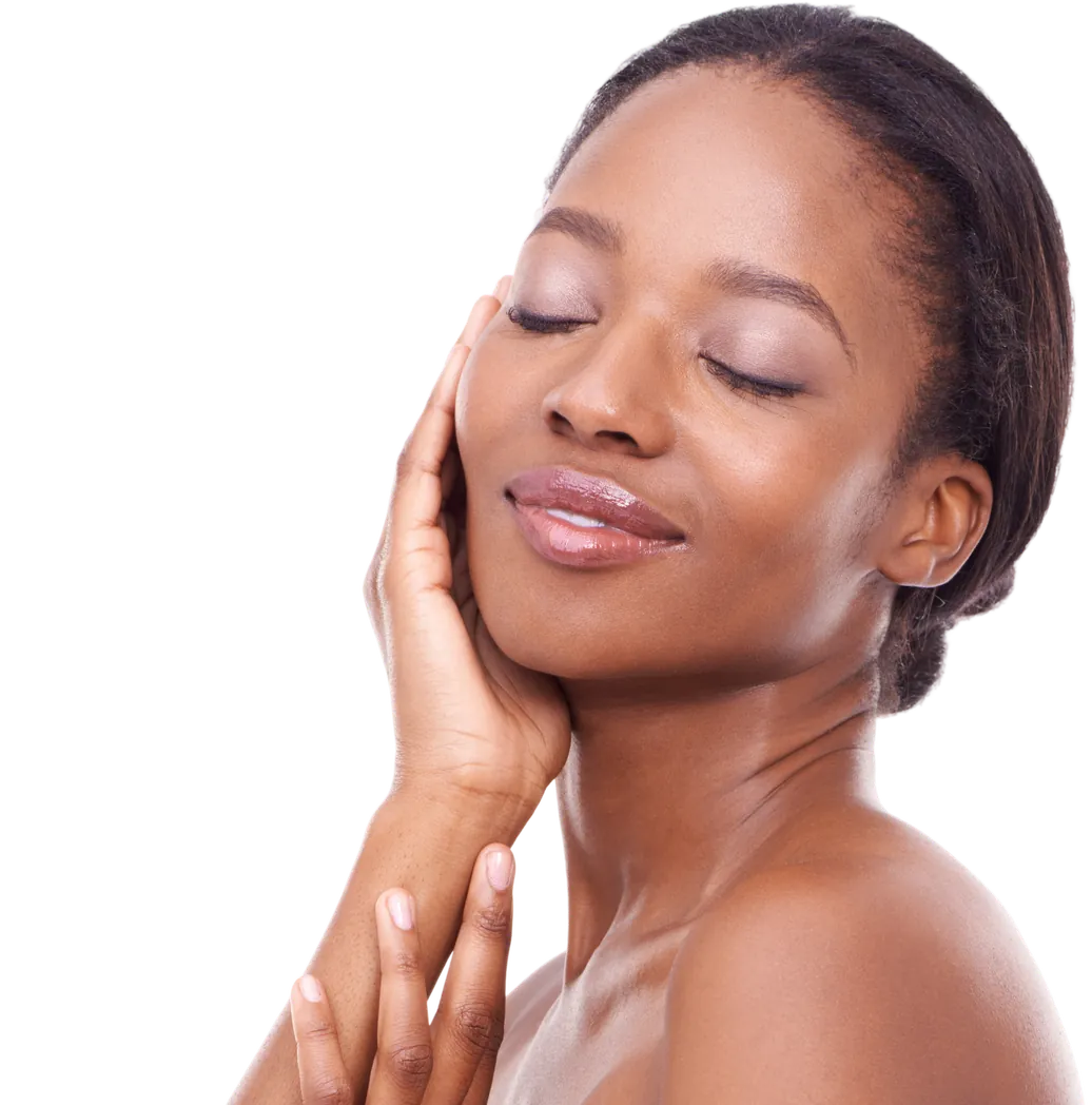 Woman with glowing skin touching her face, eyes closed